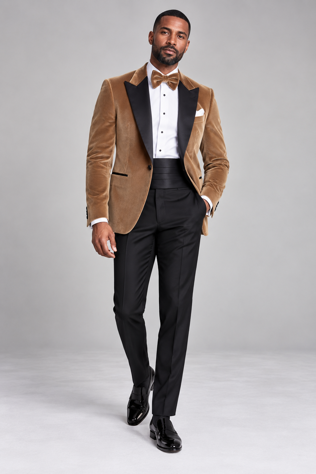 Roomten gold velvet dinner jacket with black silk peak lapels and black evening trousers