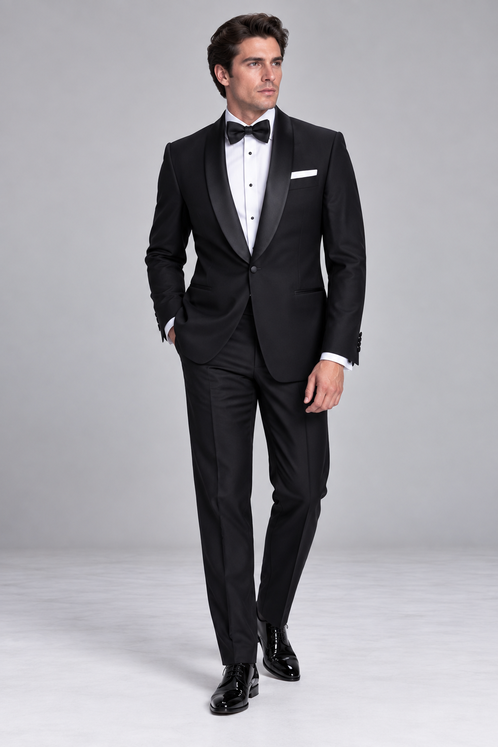 Roomten black dinner suit with a continuous silk shawl collar and one-button fastening