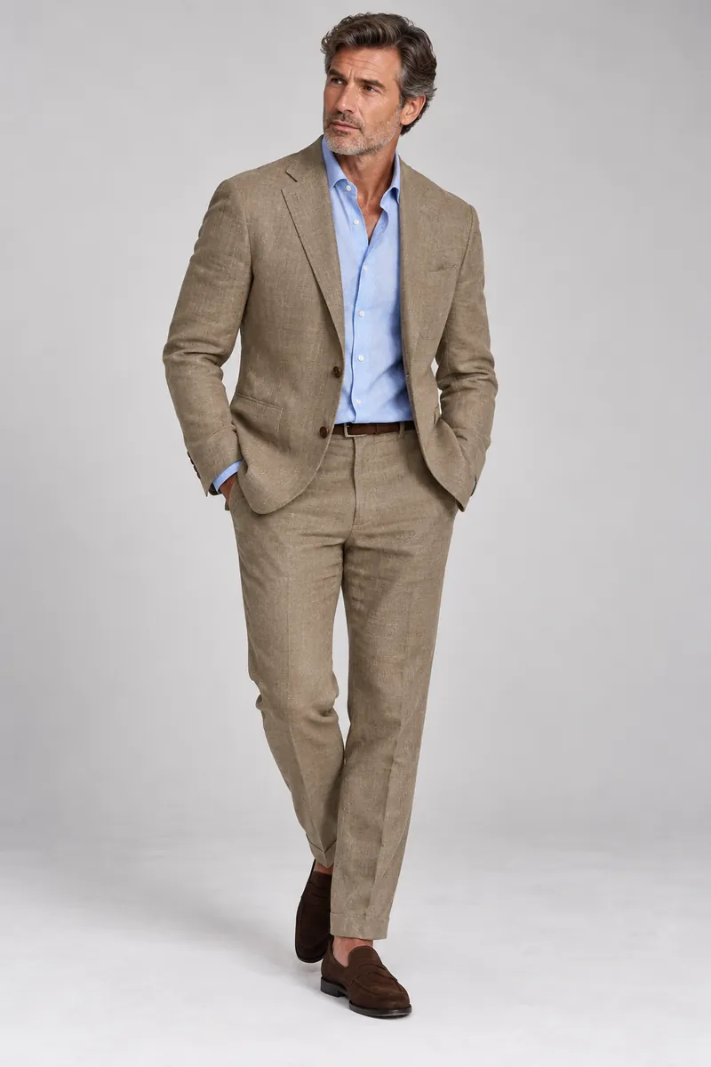 Tan linen made-to-measure two-piece suit photographed on the wearer
