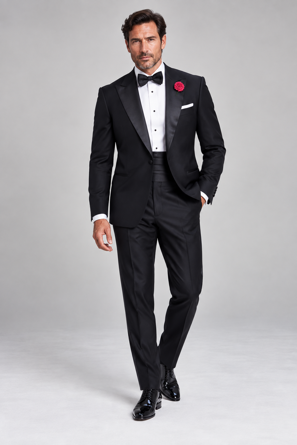 Roomten black made-to-measure dinner suit with silk peak lapels, evening shirt and black bow tie